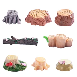Miniature resin tree stumps and branch set for DIY micro landscape garden decor.