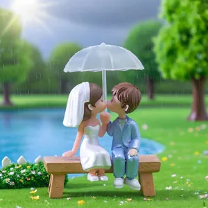 Cute wedding couple figurine under an umbrella for micro landscape and cake decoration