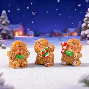 Set of three cute dancing gingerbread man figurines for festive Christmas snow DIY decor