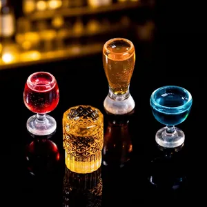 Set of four colorful miniature dollhouse drink glasses including beer and wine replicas