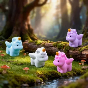 Set of colorful cartoon unicorn figurines placed in a magical forest micro landscape scene.