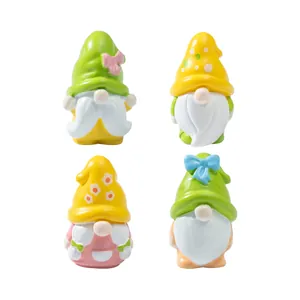 Set de cuatro lindas figuras de gnomos de primavera para decoración de jardín