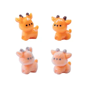 Set of four mini cartoon orange deer figurines featuring resin and flocked textures for DIY