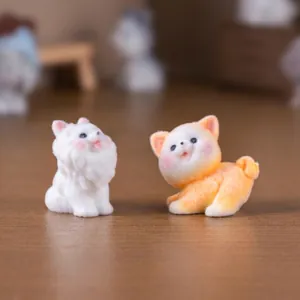 Cute flocked miniature puppy figurines featuring a white teddy and orange shiba inu