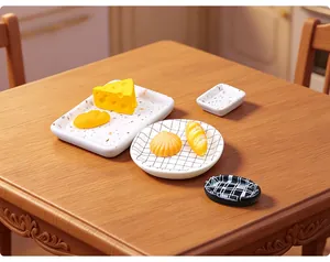 Close-up detail of miniature dollhouse plates and fake bread set in cozy dining scene