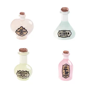 Set of four glowing miniature magic potion bottles for dollhouse decoration and DIY crafts.