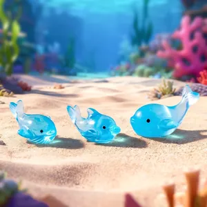 Set van 3 blauwe doorschijnende dolfijn- en walvisfiguren voor oceaan-microdecor.