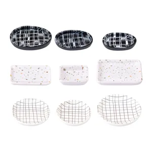Set of assorted miniature dollhouse plates with plaid and speckled patterns for DIY decor