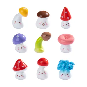 Set of cute miniature mushroom figurines with faces for DIY micro landscape garden decor.
