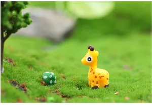 Detailed close-up of miniature resin giraffe figurine for succulent moss landscapes