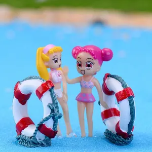 Mini figurines de filles d'anime avec bouées de sauvetage pour paysage méditerranéen