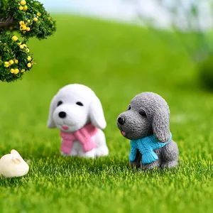 Creative miniature resin dog figurines wearing pink and blue scarves for fairy gardens