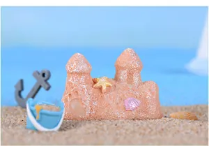 Vue détaillée d'un ornement d'aquarium château de sable miniature en résine