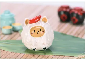 Close-up of cute Dragon Boat Festival zongzi resin figurine with red date detail decoration