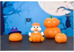 Detailed view of cute Halloween miniature pumpkin figurines for micro landscape decor