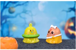 Close-up of cute cartoon Halloween alien and mummy ghost resin micro landscape ornaments