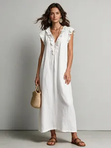 Elegant white Bohemian maxi dress with feminine ruffle V-neck and stylish cap sleeves