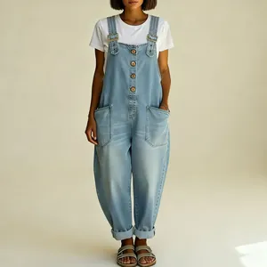 Professional full-body view of women's baggy light blue denim overalls with adjustable buckles
