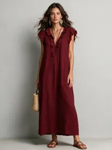 Full view of elegant bohemian burgundy floor-length maxi dress with ruffle V-neckline