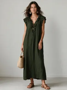 Elegant bohemian dark green floor-length maxi dress with ruffle sleeves and V-neckline.