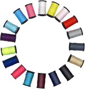 High-quality assorted colorful sewing thread spools arranged in a neat circular pattern
