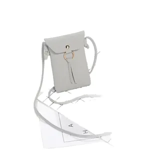 Elegant grey litchi texture crossbody phone bag with gold ring detail for women
