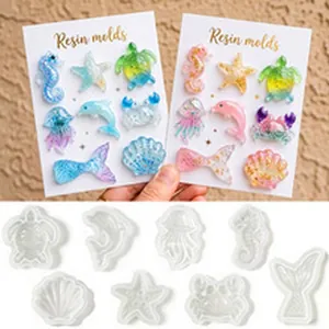 Detailed macro view of DIY sea creature silicone resin molds with finished pieces
