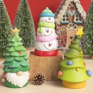 Detailed view of stackable snowman and Christmas tree silicone molds for DIY resin crafts