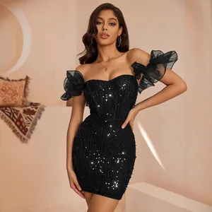 Elegant black off-shoulder sequin mini dress featuring ruffled organza sleeves for party