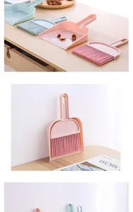 Mini stoffer en blik set voor bureau reiniging, compact ontwerp in de kleuren roze en blauw.