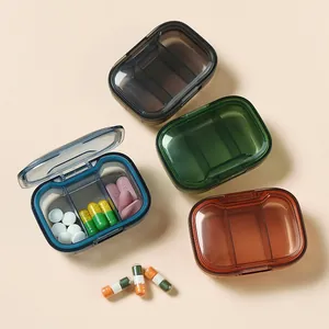 Detailed view of a portable 3-compartment pill box container for medicine storage