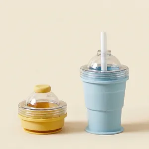 Portable silicone folding ice ball cup with straw shown in expanded and collapsed states