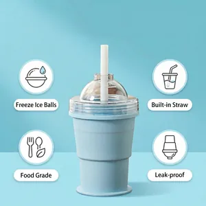 Detail of blue silicone collapsible ice ball cup with straw and food-grade material.