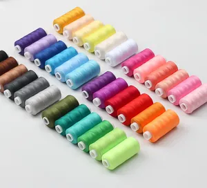 Variety of colorful 402 sewing thread spools arranged neatly for hand sewing