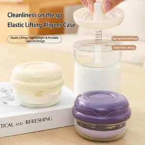 Portable denture cleaning and storage box with automatic lifting and drainage layer
