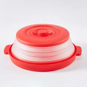Couvercle de micro-ondes pliable en silicone rouge avec évents à vapeur et poignées