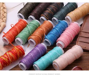 Detail display of multi-colored 150D flat waxed thread spools for leather DIY sewing