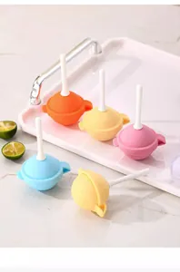 Detailed view of colorful lollipop-shaped silicone ice pop molds for homemade snacks