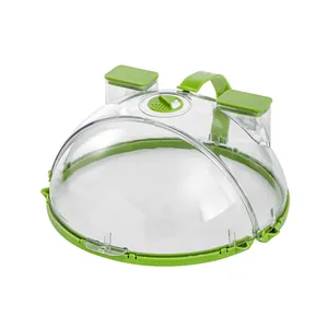 Transparent microwave splatter cover with green water reservoir for food heating