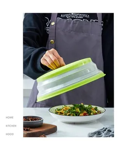 Detail shot of a collapsible silicone microwave lid being used over a bowl of food.
