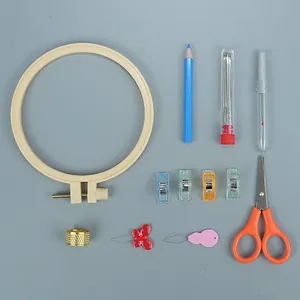 Complete DIY embroidery starter kit including hoop, needles, scissors and colorful clips