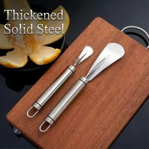 Professionele 2-in-1 roestvrijstalen pomelo-schillerset op een houten snijplank