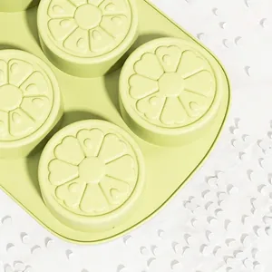 Green lemon-shaped silicone ice cube mold made of 100% premium food grade material