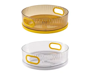 Detailed view of two 360 rotating organizers in clear and amber finishes