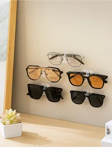 Set of wall-mounted clear acrylic glasses storage racks displaying five sunglasses