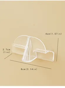 Detail view of a transparent wall-mounted glasses holder with clear dimension markings.