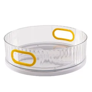 Large transparent rotating makeup organizer with yellow handles and white base