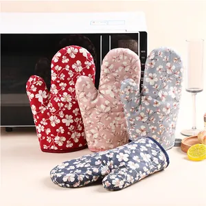 Set of thick floral print heat resistant oven mitts for kitchen baking and microwave use