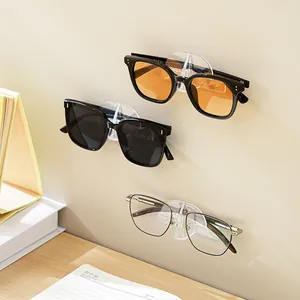 Minimalist wall-mounted transparent acrylic eyeglass holder for sunglasses