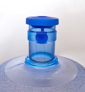 Detail view of a blue silicone reusable dustproof sealing cap on a large water jug